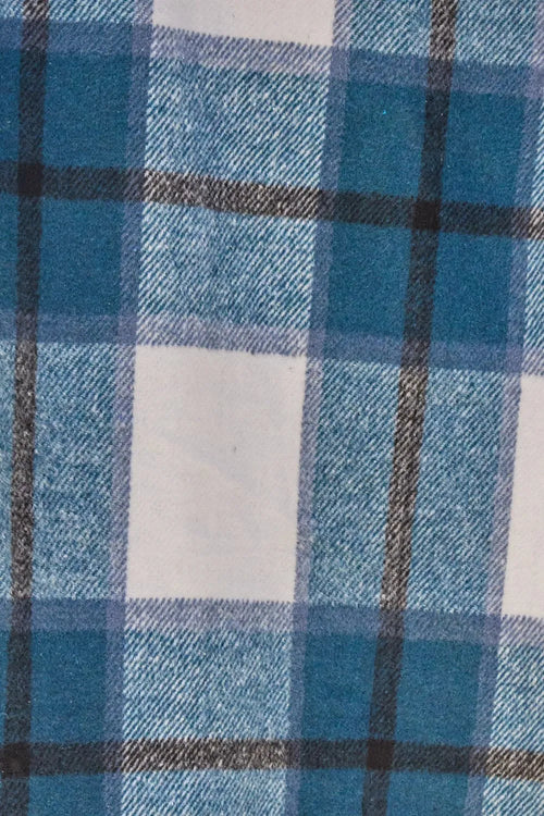 Close-up of blue and white plaid fabric