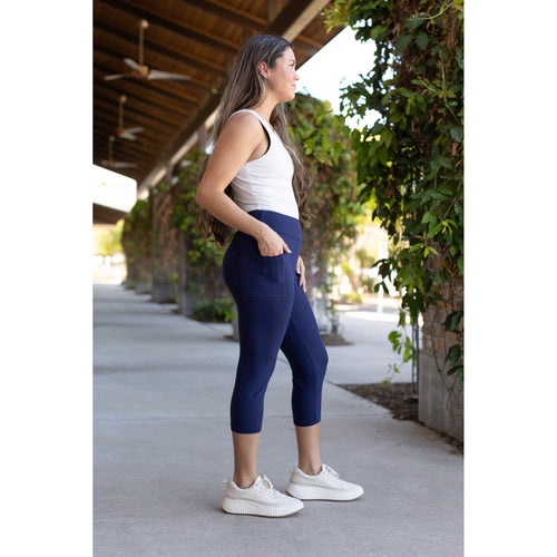 Julia Rose The Nova navy capri leggings with pocket, Women wearing navy capri leggings with side pocket