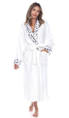 Woman wearing white plush robe with leopard trim front view