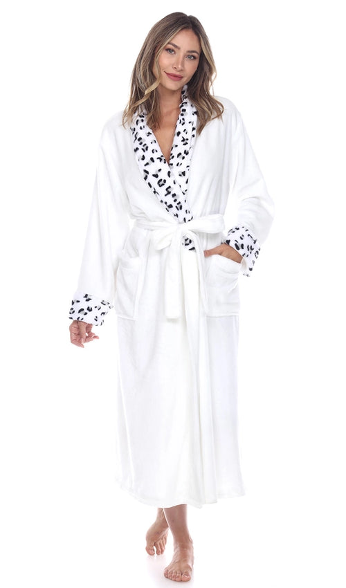 Woman wearing white plush robe with leopard trim front view