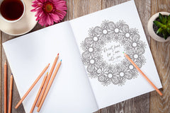 Inside page of God's Words for You coloring book featuring Isaiah 41:10 floral wreath