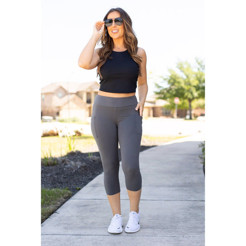 Julia Rose The Dani charcoal capri leggings with pockets, Women wearing charcoal capri pocket leggings