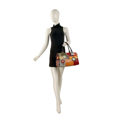 Unique patchwork genuine leather satchel shown on mannequin for size reference