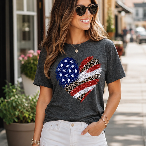 Dark heather grey Flag Heart Graphic Tee with American flag heart graphic and leopard print accents on model.