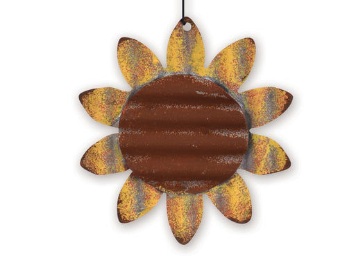 Decorative metal sunflower ornament with rusted brown center and yellow petals on a white background