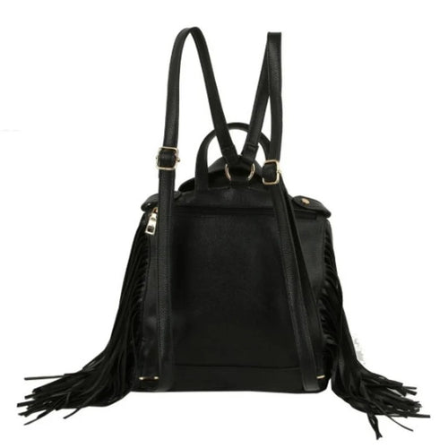 Black vegan-leather backpack with long fringe tassels on the sides and top handles, featuring gold-tone hardware, shown against a plain white background.