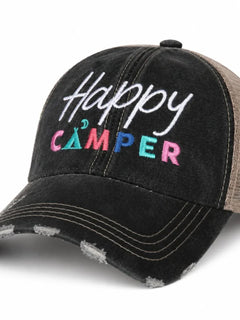A black distressed trucker cap with 'Happy CAMPER' embroidered on the front. The cap features a black washed cotton front panel with white script 'Happy' and colorful 'CAMPER' lettering in pink, teal, and blue, paired with a brown mesh back.