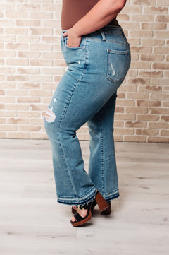 Judy Blue Isla Mid Rise Distressed Bootcut Jeans – Vintage Wash with Released Hem | Sizes 0–24W