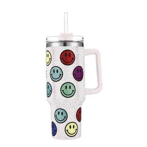 White rhinestone 40oz tumbler with multicolored smiley faces, handle and straw