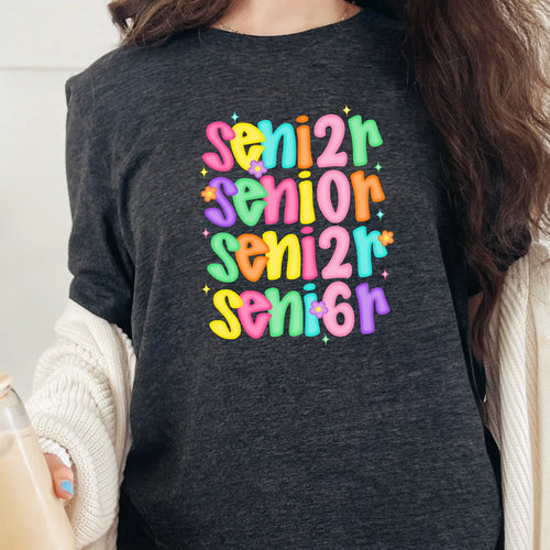 Dark Heather Grey Senior 2026 graphic tee with colorful retro-inspired lettering