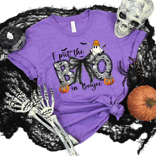 Boo in Boujee graphic tee in heather purple styled with Halloween props.