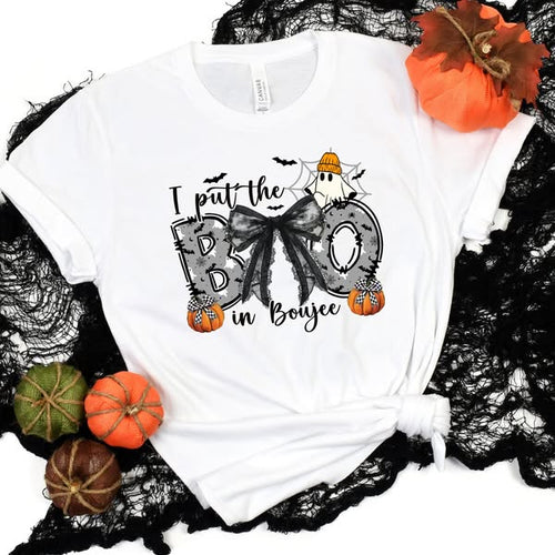 Boo in Boujee graphic tee in white, flat lay with mini pumpkins and black lace.