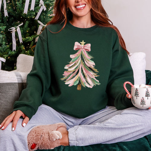 Forest green Christmas crewneck with festive painted tree design