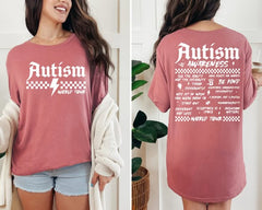Vintage style graphic tee. Front shows 'Autism World Tour' with a lightning bolt. Back shows a list of advocacy phrases designed like concert tour dates.
