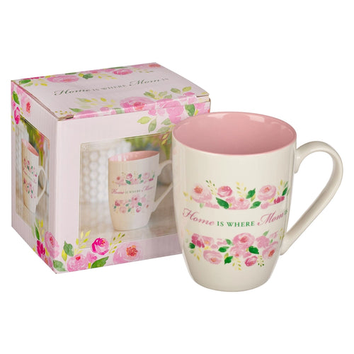 Floral mug with 'Home is Where Mom is' text in a matching box on a white background