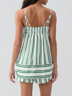 Casual summer look with smocked cami and pocketed shorts in white and green. Back View