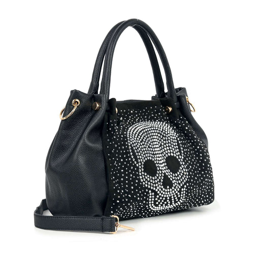 Side view of black rhinestone skull handbag with detachable strap