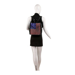 Model view of a black rhinestone flag backpack worn on the back.