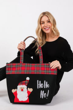 Blonde woman modeling a large red plaid Christmas tote bag with a Santa and “Ho Ho Ho!” print