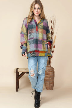 Styled outfit with the plaid Henley hoodie paired with jeans and boots.