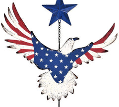 Close-up of patriotic metal eagle design with red white and blue wings and star details.
