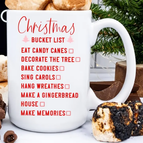 White ceramic Christmas Bucket List mug with holiday activities checklist