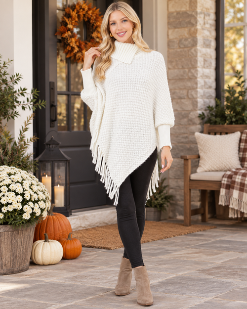 Ivory cozy cowl neck fringe poncho styled for fall