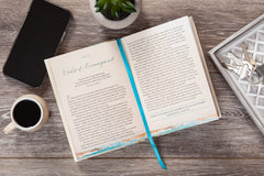 Interior page of Dear Anxiety devotional showing Day 13 'Words of Encouragement' and a teal ribbon bookmark.
