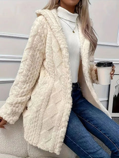 Side angle of cream teddy coat showing button detail