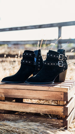 Elsa Leather Ankle Boots in Black - Genuine Suede with Cushioned Footbed, Adjustable Buckles, Stylish Brass Grommets