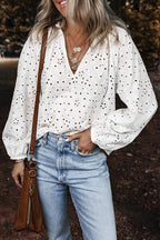 Front view of the Eyelet V-Neck Long Sleeve Blouse in white with delicate cutout details.