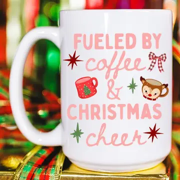 Christmas mug with pink Fueled by Coffee and Christmas Cheer design