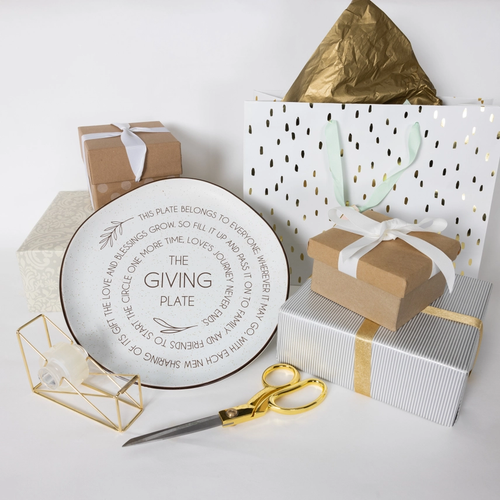 The Giving Plate styled among gift-wrapping supplies and wrapped presents; wrapping not included