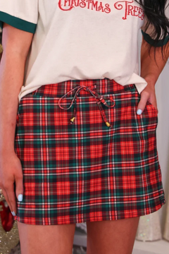 Close-up of red Christmas plaid skort with drawstring and pockets