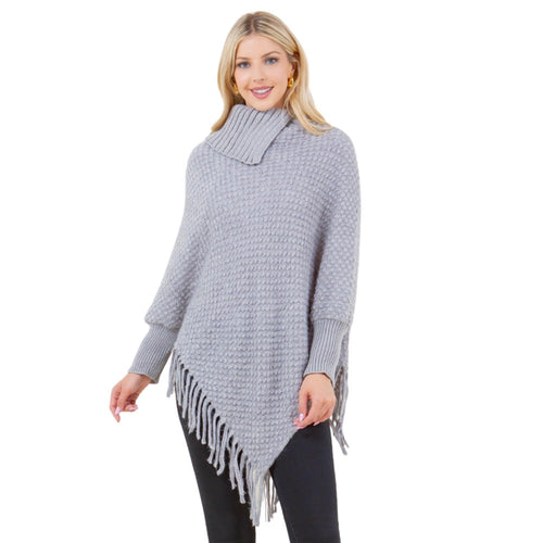 Knit cowl neck poncho with sleeves and fringe in gray