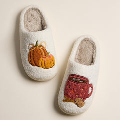Pumpkin and brewed cup fuzzy slippers angled view